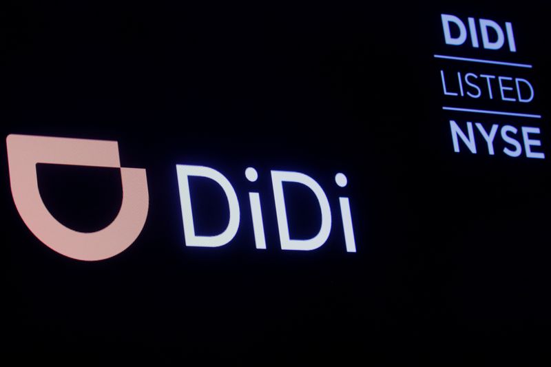 &copy; Reuters. FILE PHOTO: A screen displays trading information for ride-hailing giant Didi Global on the floor of the New York Stock Exchange (NYSE) in New York City, U.S., December 3, 2021.  REUTERS/Brendan McDermid