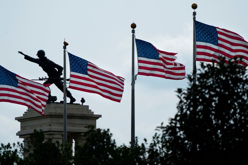 &copy; Reuters. FILE PHOTO: Flags and a monument are seen at the entrance to Fort Benning in Columbus, Georgia, U.S. September 8, 2020. REUTERS/Elijah Nouvelage/File Photo