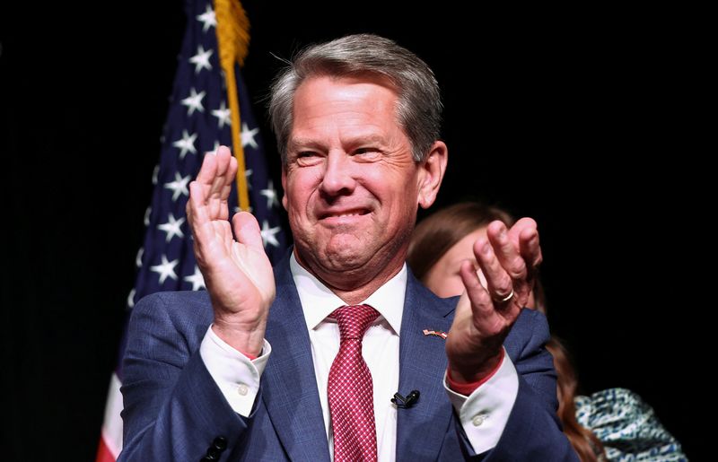 &copy; Reuters. Governor Brian Kemp applauds after winning the Republican primary during his primary election watch party in Atlanta, Georgia, U.S. May 24, 2022.  REUTERS/Dustin Chambers
