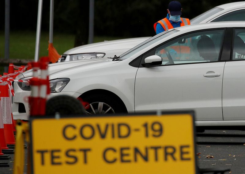 &copy; Reuters. FILE PHOTO: A drive-through testing centre in Bolton, Britain, September 22, 2020. REUTERS/Phil Noble/File Photo