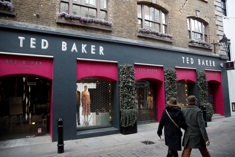 &copy; Reuters. FILE PHOTO: People walk past a Ted Baker store on Floral Street, in London, Britain, April 3, 2022.  Picture taken April 3, 2022.  REUTERS/Peter Nicholls