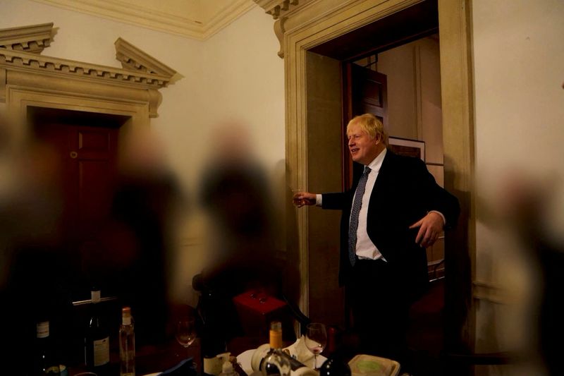 &copy; Reuters. FILE PHOTO: British Prime Minister Boris Johnson gestures in 10 Downing Street during gathering on the departure of a special adviser, in London, Britain November 13, 2020 in this picture obtained from civil servant Sue Gray's report published on May 25, 