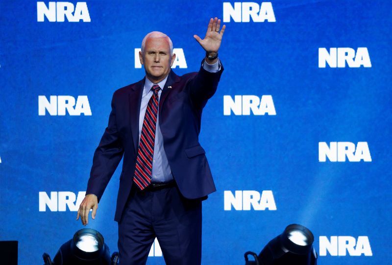 &copy; Reuters. FILE PHOTO: Former Vice President Mike Pence gestures at the National Rifle Association (NRA) annual meeting in Indianapolis, Indiana, U.S. April 14, 2023. REUTERS/Chris Bergin