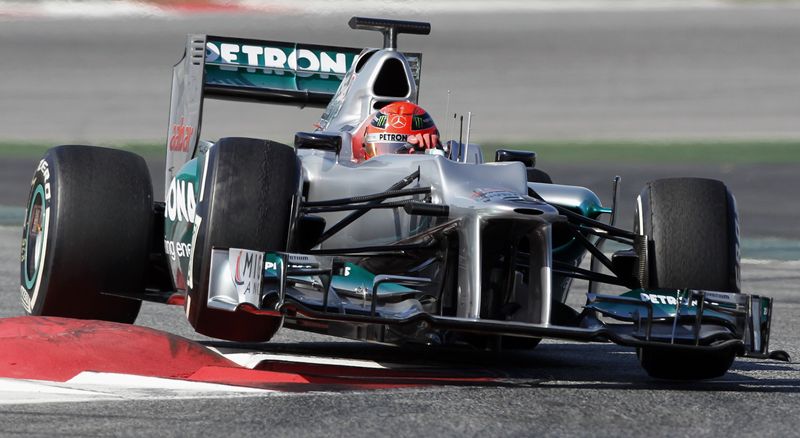&copy; Reuters. FILE PHOTO: Mercedes Formula One driver Michael Schumacher of Germany takes a curve during a training session at Circuit de Catalunya racetrack, in Montmelo, near Barcelona, February 21, 2012. REUTERS/Albert Gea