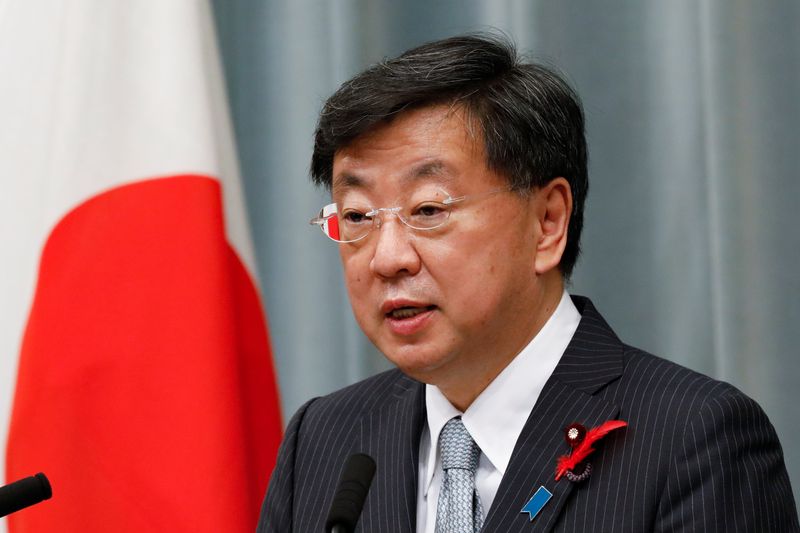 &copy; Reuters. Japan's new Chief of Cabinet Secretary Matsuno Hirokazu announces new cabinet members at a news conference in Tokyo, Japan October 4, 2021. REUTERS/Kim Kyung-Hoon/File Photo