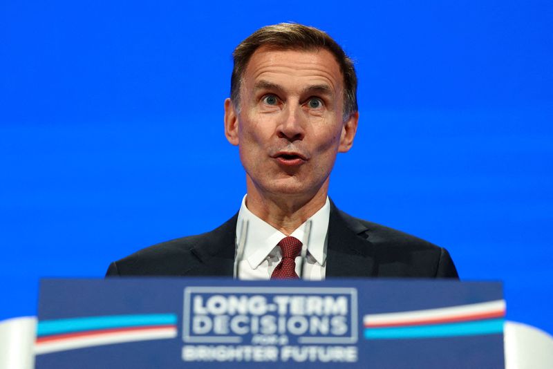 UK's Hunt says will change law to stop political 'debanking'