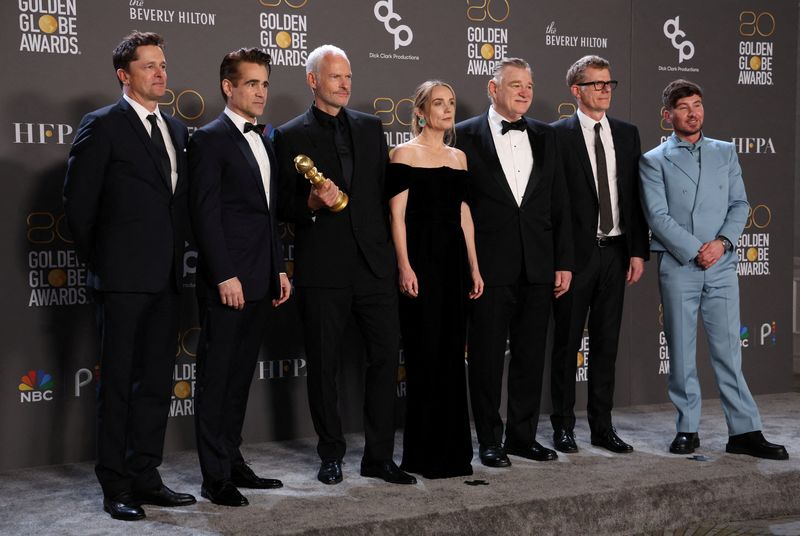 &copy; Reuters. FILE PHOTO: Director Martin McDonagh, cast members and crew of "The Banshees of Inisherin" pose with their award for Best Motion Picture in a Musical or Comedy,  at the 80th Annual Golden Globe Awards in Beverly Hills, California, U.S., January 10, 2023. 