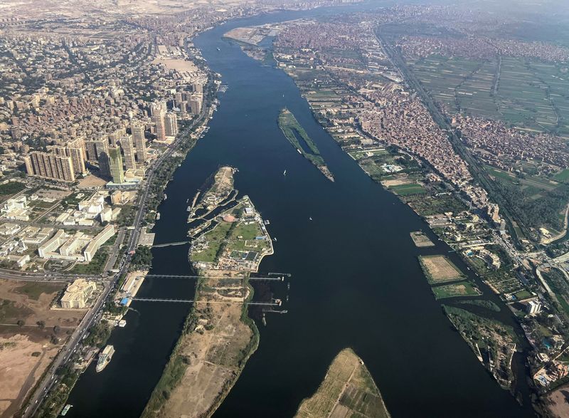 &copy; Reuters. A view from an airplane window shows buildings around the Nile River in Cairo, Egypt, May 2, 2023. REUTERS/Mohamed Abd El Ghany/File photo