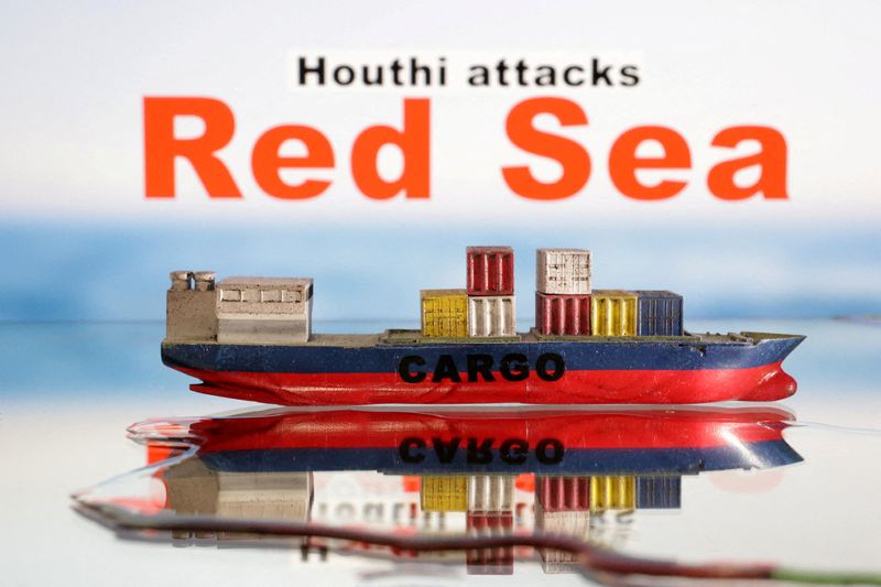 &copy; Reuters. نموذج لسفينة بضائع وكلمات "البحر الأحمر" و "هجمات الحوثيين" باللغة الإنجليزية في صورة توضيحية التقطت في التاسع من يناير كانون الثاني 2024 . تصو