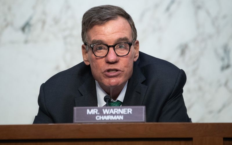 &copy; Reuters. U.S. Senator Mark Warner, Democrat of Virginia and Chairman of the Senate Select Committee on Intelligence, holds a hearing about worldwide threats, on Capitol Hill in Washington, DC, U.S., April 14, 2021. Saul Loeb/Pool via REUTERS/File Photo