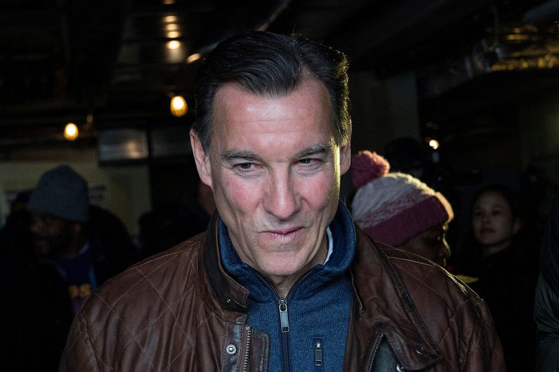 &copy; Reuters. Democratic congressional candidate for New York's 3rd congressional district, Tom Suozzi, exits the building after campaigning in Westbury, New York, U.S., February 13, 2024.   REUTERS/Eduardo Munoz