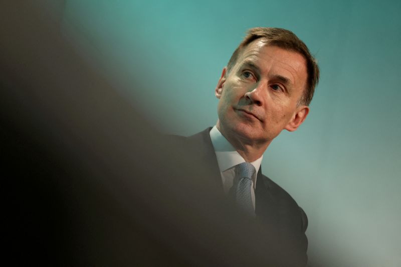 &copy; Reuters. FILE PHOTO: British Chancellor of the Exchequer Jeremy Hunt looks on as he speaks at the Resolution Foundation, in London, Britain December 4, 2023. REUTERS/Hollie Adams/File Photo