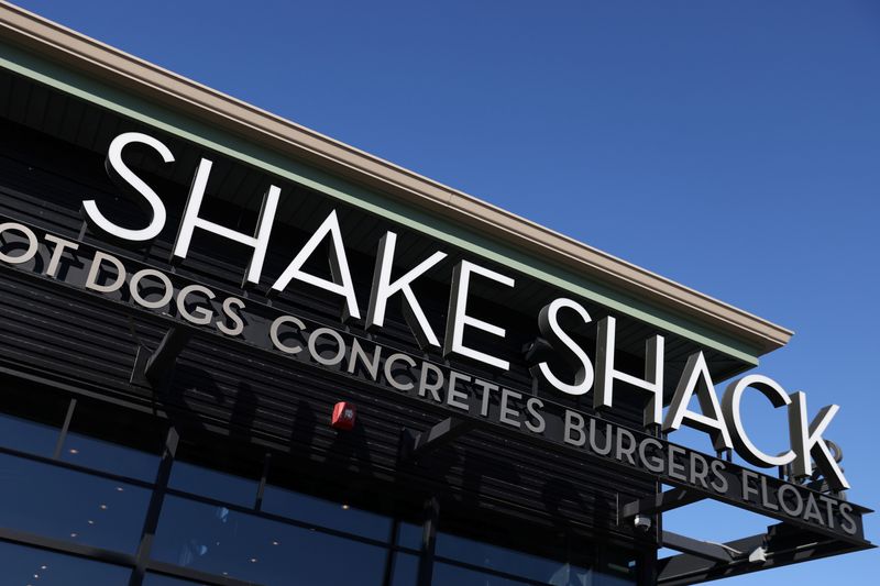 &copy; Reuters. Shake Shack signage is seen at their restaurant at the Woodbury Common Premium Outlets in Central Valley, New York, U.S., February 15, 2022. REUTERS/Andrew Kelly/File Photo
