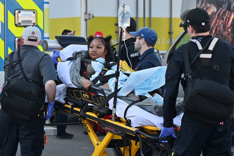 &copy; Reuters. Feb 14, 2024; Kansas City, MO, USA; Injured fans are assisted by medical personnel after shots were fired after the celebration the celebration of the Kansas City Chiefs winning Super Bowl LVIII. Mandatory Credit: David Rainey-USA TODAY Sports/ File photo