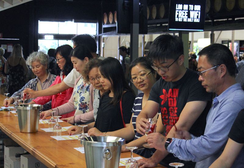 &copy; Reuters. FILE PHOTO: Chinese tourists sample wine at McGuigan Winery in the Hunter Valley, located north of Sydney in Australia, February 3, 2018. REUTERS/Tom Westbrook/File Photo