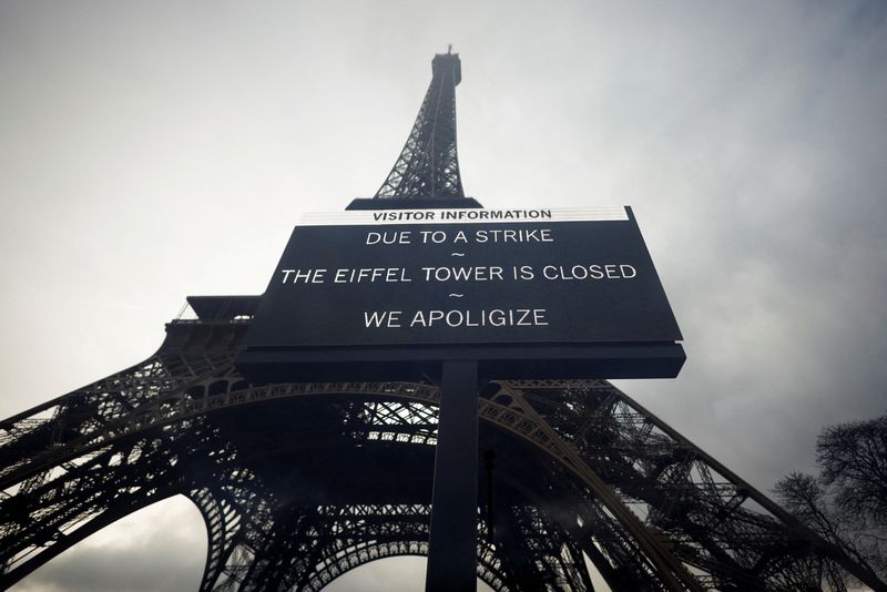 &copy; Reuters. A sign reading "Due to a strike, the Eiffel Tower is closed. We apoligize" hangs in front of the Eiffel Tower in Paris, France, February 19, 2024. Picture taken through glass. REUTERS/Sarah Meyssonnier