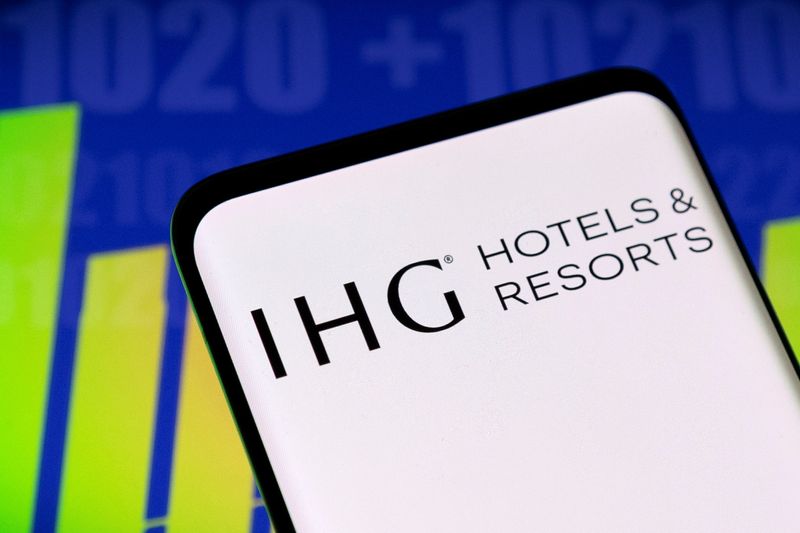 &copy; Reuters. IHG logo and stock graph are seen displayed in this illustration taken, May 3, 2022. REUTERS/Dado Ruvic/Illustration