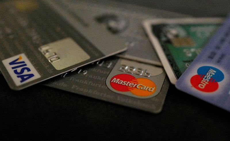 &copy; Reuters. FILE PHOTO: Bank debit and credit cards are photographed in this illustration picture at an office in Frankfurt, Germany, March 17, 2016. REUTERS/Kai Pfaffenbach