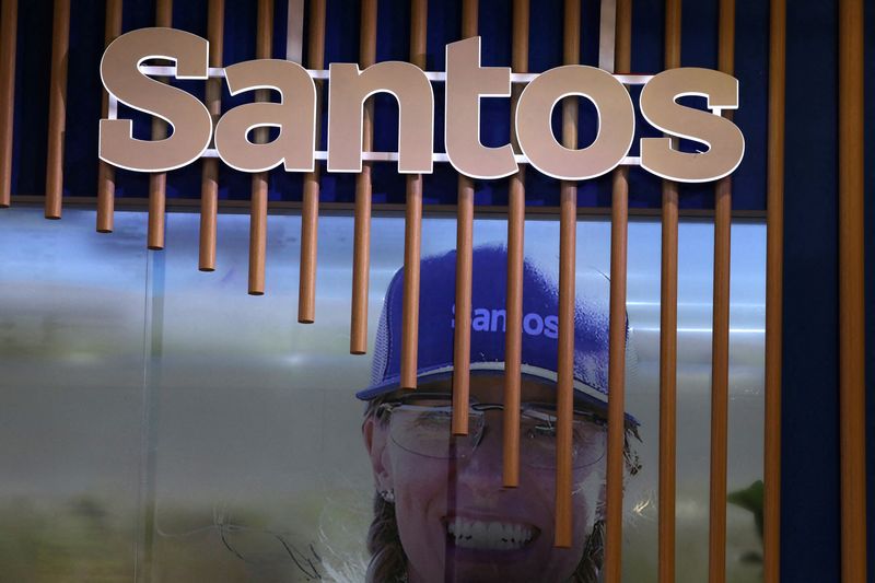 &copy; Reuters. FILE PHOTO: The logo of Australian oil and gas exploration and production company Santos is displayed during the LNG 2023 energy trade show in Vancouver, British Columbia, Canada, July 12, 2023. REUTERS/Chris Helgren/File Photo