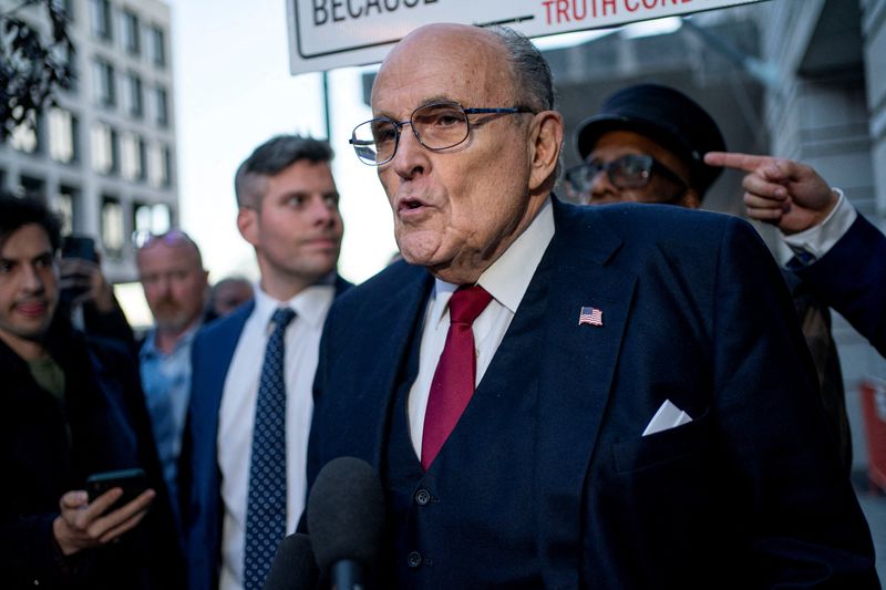 &copy; Reuters. FILE PHOTO: Former New York Mayor Rudy Giuliani departs the U.S. District Courthouse after he was ordered to pay $148 million in his defamation case in Washington, U.S., December 15, 2023. REUTERS/Bonnie Cash/File Photo