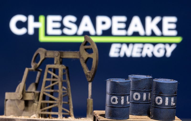 &copy; Reuters. FILE PHOTO: A 3D printed oil barrels and oil pump jack are seen in front of displayed Chesapeake Energy logo in this illustration taken January 25, 2022. REUTERS/Dado Ruvic/Illustration/File Photo