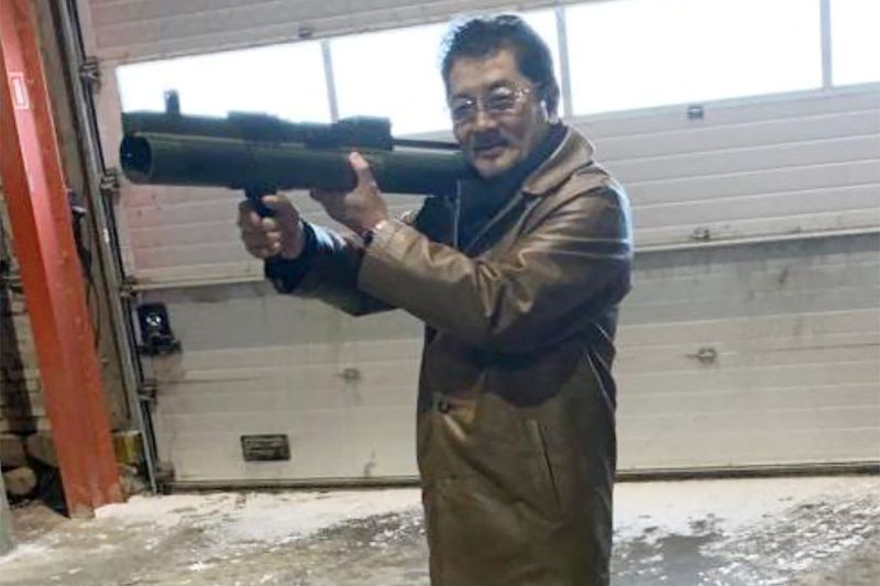 &copy; Reuters. Takeshi Ebisawa poses with a rocket launcher during a meeting with an informant and two undercover Danish police officers at a warehouse in Copenhagen, Denmark February 3, 2021, in a photograph from a Drug Enforcement Administration (DEA) criminal complai