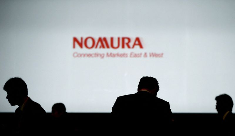 Nomura traders burst into applause as Nikkei hits record high