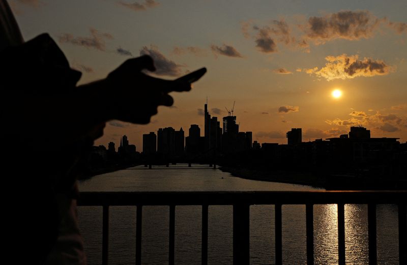 &copy; Reuters. FILE PHOTO: A view of the river Main as the sun sets behind the skyline in Frankfurt, Germany, July 3, 2023. REUTERS/Kai Pfaffenbach/File Photo
