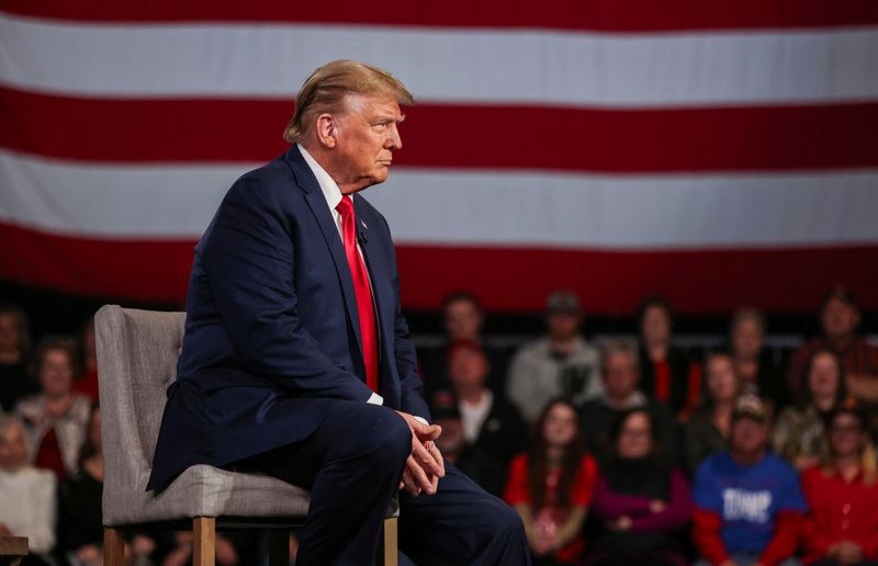 &copy; Reuters. FILE PHOTO: Former U.S. President and Republican presidential candidate Donald Trump participates in a Fox News town hall with Laura Ingraham in Greenville, South Carolina, U.S. February 20, 2024.  REUTERS/Sam Wolfe/File Photo