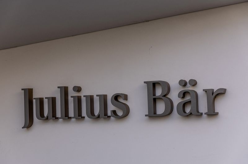 &copy; Reuters. FILE PHOTO: A logo is pictured on the branch of Swiss private bank Julius Baer, after the disclosure of an exposure with the property and retail giant Signa, in Lausanne, Switzerland, November 29, 2023. REUTERS/Denis Balibouse/File Photo
