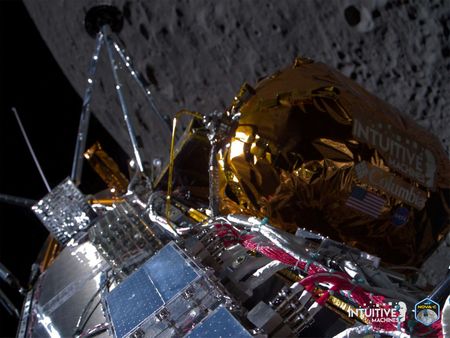 Moon lander tipped sideways on lunar surface but 'alive and well' By Reuters