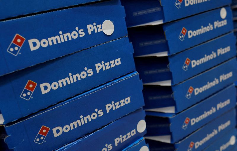 &copy; Reuters. FILE PHOTO: Domino's pizza boxes are pictured inside a restaurant in Noida, India, July 4, 2023. REUTERS/Adnan Abidi/File Photo