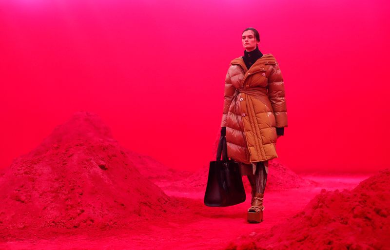 &copy; Reuters. FILE PHOTO: A model presents a creation from the Moncler Autumn/Winter 2020 collection during Milan Fashion Week in Milan, Italy February 19, 2020. REUTERS/Alessandro Garofalo/File Photo