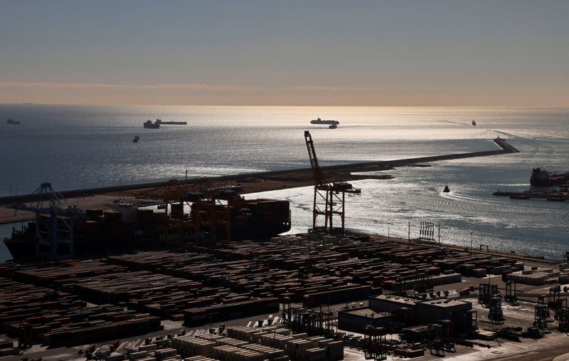 &copy; Reuters. FILE PHOTO: Shipping containers move at the port of Barcelona, after stevedores' union has refused to load and unload any military material amid the war in Gaza and urged the protection of civilian populations in areas of conflict, in Barcelona, Spain, No