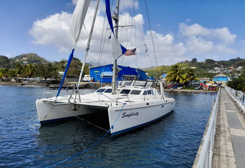 &copy; Reuters. The catamaran that was hijacked by three fugitives in the waters off the island of Grenada, which authorities are investigating as part of the possible murder of two people believed to be U.S. citizens, is docked at St. Vincent and the Grenadines Coastgua