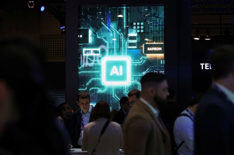 &copy; Reuters. People walk near a sign for Sapeon, an artificial intelligence (AI) chip company, at the Mobile World Congress (MWC) in Barcelona, Spain, February 27, 2024. REUTERS/Bruna Casas