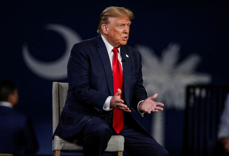 &copy; Reuters. FILE PHOTO: Former U.S. President and Republican presidential candidate Donald Trump participates in a Fox News town hall with Laura Ingraham in Greenville, South Carolina, U.S. February 20, 2024.  REUTERS/Sam Wolfe/File Photo