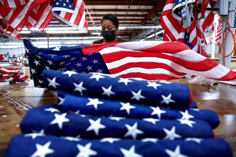 &copy; Reuters. FILE PHOTO: Barbara McClorin inspects U.S. flags made at Valley Forge Flag’s manufacturing facility in Lane, South Carolina, U.S., February 22, 2024. REUTERS/Evelyn Hockstein/File Photo