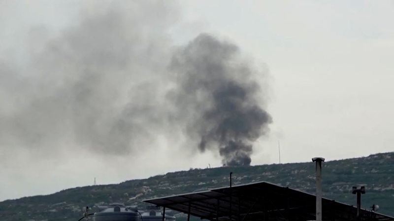 &copy; Reuters. Black smoke rises from a site believed to have been hit by an Israeli strike, in southern Lebanon, in this screen grab taken from a video, February 27, 2024. REUTERS TV via REUTERS/File Photo