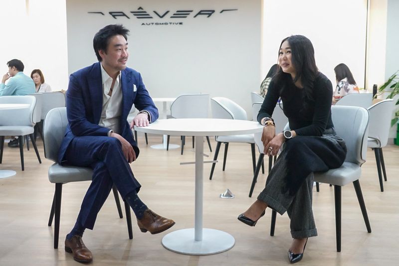 &copy; Reuters. CEO Pratarnwong Phornprapha and Vice CEO Pratarnporn Phornprapha of Rever Automotive speak during an interview with Reuters in Bangkok, Thailand, January 18, 2024. REUTERS/Devjyot Ghoshal