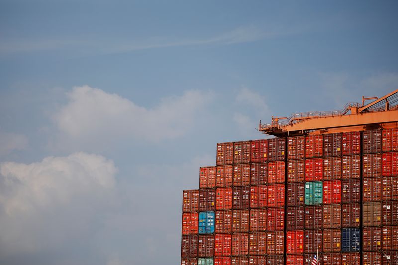 &copy; Reuters. FILE PHOTO: Shipping containers are stacked up on a container ship at Pusan Newport Terminal in Busan, South Korea, July 1, 2021. REUTERS/Kim Hong-Ji/File Photo