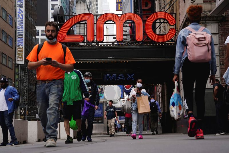 &copy; Reuters. FILE PHOTO: An AMC theatre is pictured in Times Square in the Manhattan borough of New York City, New York, U.S., June 2, 2021.  REUTERS/Carlo Allegri/File Photo