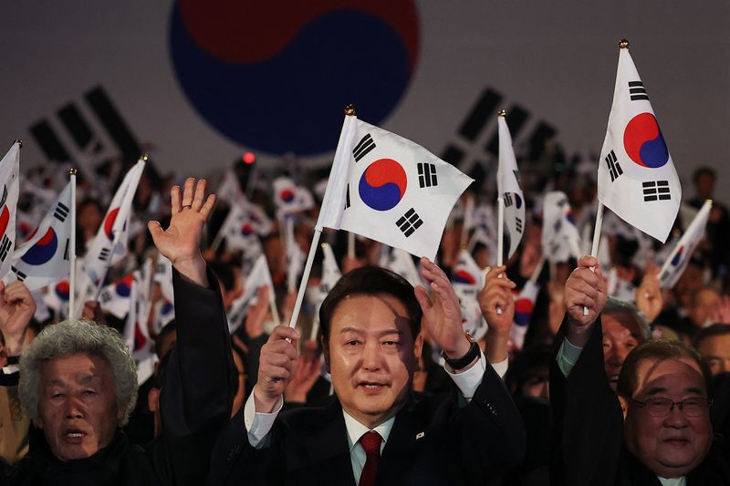 &copy; Reuters. South Korea's President Yoon Suk Yeol gives three cheers during a ceremony of the 105th anniversary of the March 1st Independence Movement Day in Seoul, South Korea, March 1, 2024.    REUTERS/Kim Hong-Ji/Pool