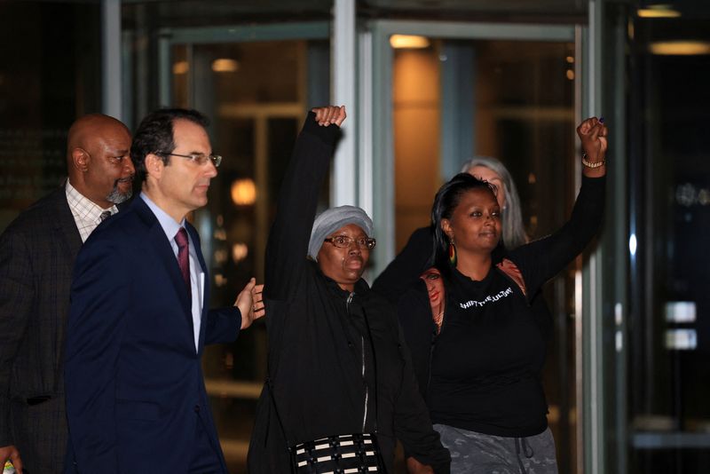 &copy; Reuters. FILE PHOTO: Sheneen McClain gestures as she exits the Adams County District Court with Colorado Attorney General Phil Weiser after a jury delivered a guilty verdict of criminally negligent homicide for two paramedics who in 2019 injected her son Elijah Mc