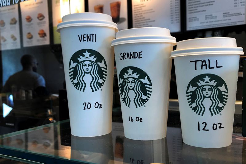&copy; Reuters. Starbucks cups are pictured on a counter in the Manhattan borough of New York City, New York, U.S., February 16, 2022. REUTERS/Carlo Allegri/File Photo