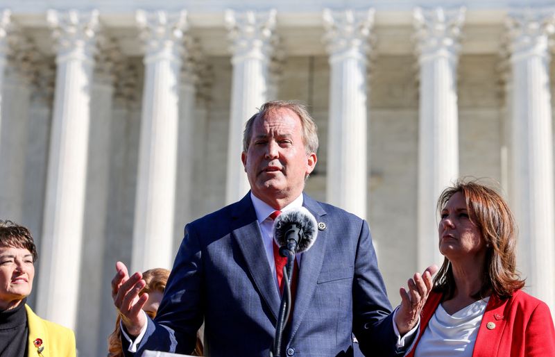 &copy; Reuters. FILE PHOTO: Texas Attorney General Ken Paxton speaks to anti-abortion supporters outside the U.S. Supreme Court following arguments over a challenge to a Texas law that bans abortion after six weeks in Washington, U.S., November 1, 2021. REUTERS/Evelyn Ho