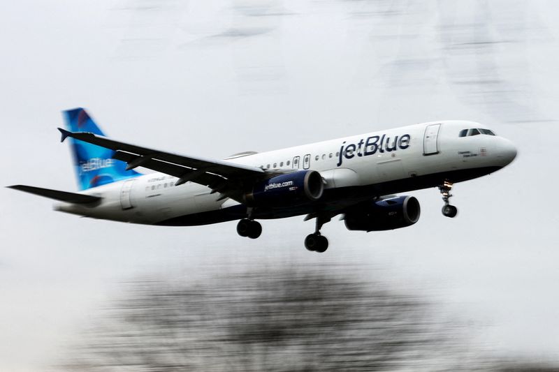 &copy; Reuters. FILE PHOTO: A JetBlue Airways jet comes in for a landing after flights earlier were grounded during an FAA system outage at Laguardia Airport in New York City, New York, U.S., January 11, 2023. REUTERS/Mike Segar/File Photo