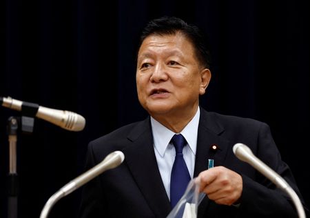 Japan's ministers deny report government thinking of calling end to deflation By Reuters