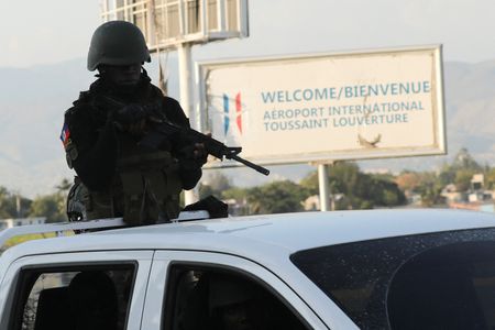 Haiti PM's return still murky as gang conflict worsens By Reuters
