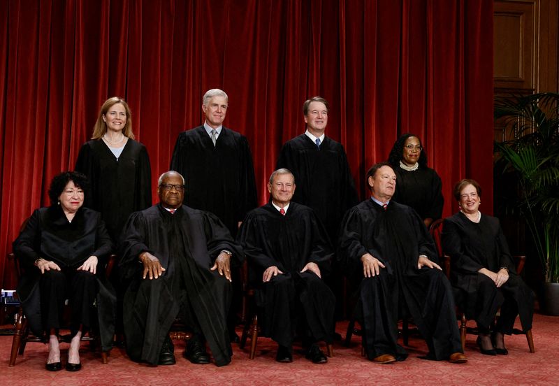 &copy; Reuters. FILE PHOTO: U.S. Supreme Court justices pose for their group portrait at the Supreme Court in Washington, U.S., October 7, 2022. Seated (L-R): Justices Sonia Sotomayor, Clarence Thomas, Chief Justice John G. Roberts, Jr., Samuel A. Alito, Jr. and Elena Ka